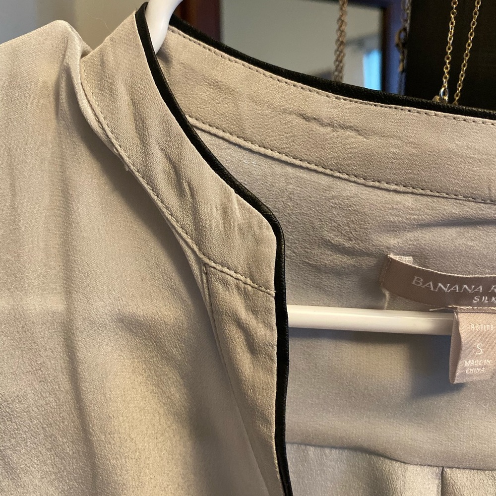 Gray silk shirt with thin black leather neck trim
